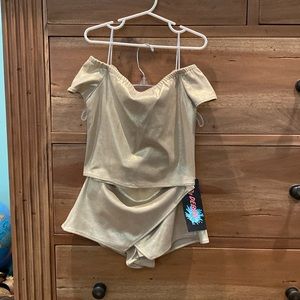 2 piece gold off the shoulder top and matching skorts